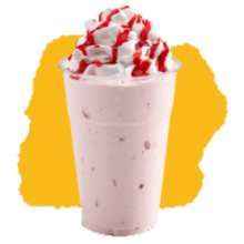 Strawberry milkshake with cream top and strawberry sauce on top